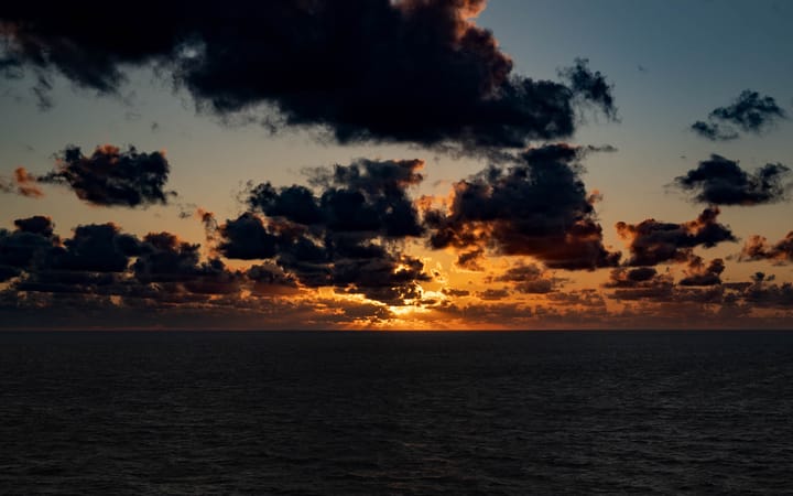 Photograph of a sunset at sea. 